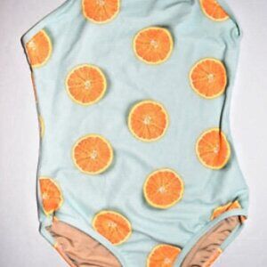 Mint green bathing suit with orange slices